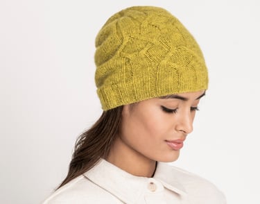 Woman in knit hat of Woolstok Light yarn