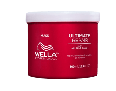 Wella Color Boost Treatment - Specialist Color Mask under a heat lamp