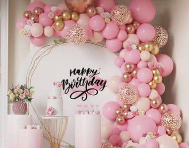 a birthday party with balloons and balloons