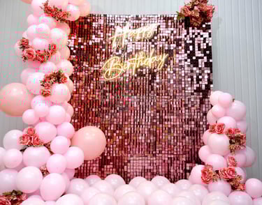 a birthday party with balloons and balloons