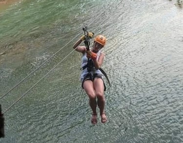Zipline over the caves branch river / Jaguar Paw Cave and Jungle Expedition