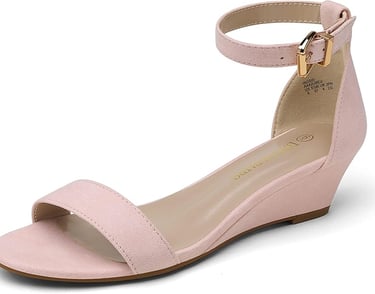 a woman's pink wedged sandal with a gold buckle