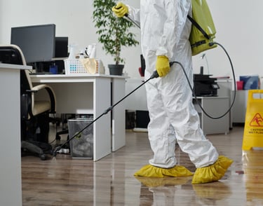 Our team member disinfecting surfaces for a healthy environment.