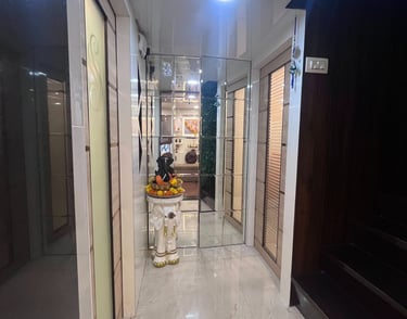 Dr Seema Sheen Aesthetics hallway with a lot of white and black furniture