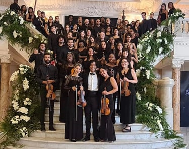 a group of musicians and musicians in a large room