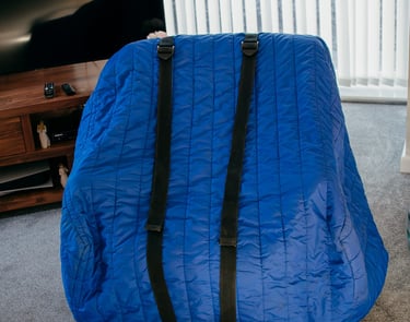 chair coverd in blue protective covering