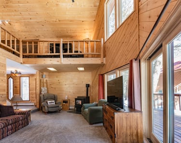 a living room with a couch and a television