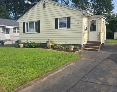 The welcoming front entrance and porch of the Hartford home.