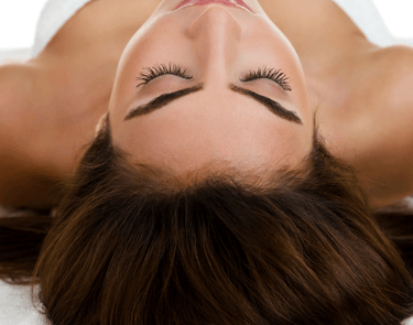 a woman getting ready for massage at Kayuh spa