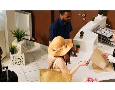 a woman in a hat and a man in a suit and tie