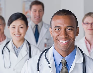 Physician reviewing patient information in a clinical setting