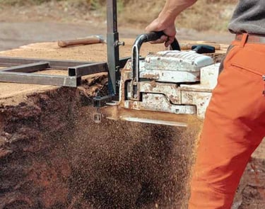 A Custom Concrete worker cutting and sawing concrete for professional finish
