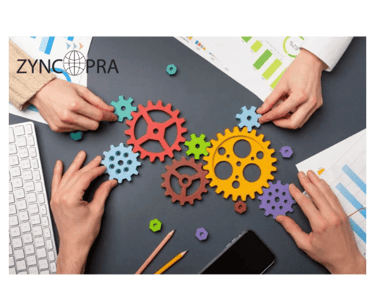 Team collaborating with colorful gears, representing Zyncopra’s transparent distribution process.