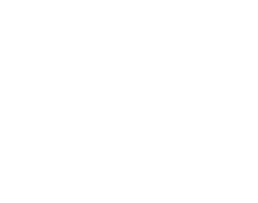 White real estate icon featuring a residential house in front of tall city skyscrapers on a black background.