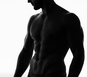 a man in a black and white photo of a man in underwear