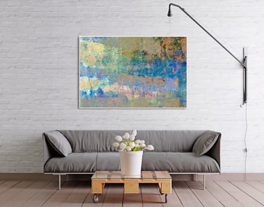 neutral coloured sofa with Nubes I picture on a white wall