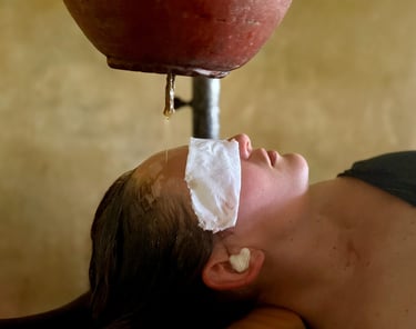 Alena Booth, founded of Grateful Minds on her Panchakarma retreat in India, Shirodhara