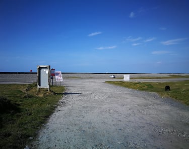 Entrance to Ynyslas turn camper van car park.