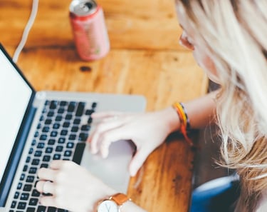 Person is typing on laptop marketing