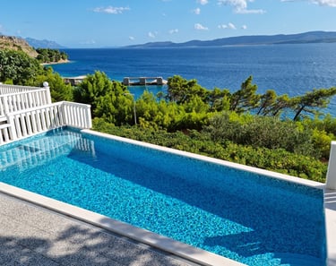 This photo shows the entire private pool with an unobstructed sea view.
