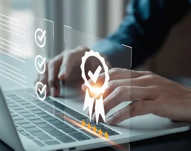 Professional person using a laptop with digital icons for quality assurance and certification.