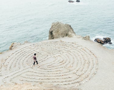 a man walking through a labyrinth