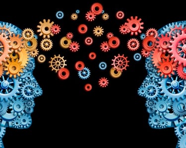 imagem de duas cabeças com forma de engrenagem uma olhando para a outra.