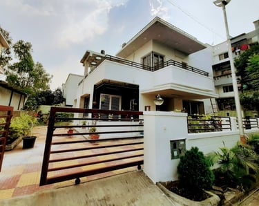 Completed exterior house painting project by House of Painting showcasing smooth, even coverage 