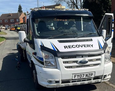 alt="Recovery truck loading non-runner car in Evesham"