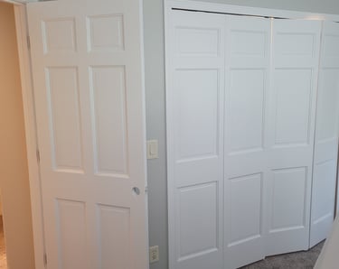 American Painting Specialist Fort Wayne, Indiana White spray painted doors.