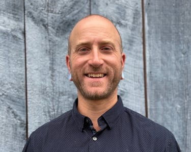 head shot of Harrison Blum smiling