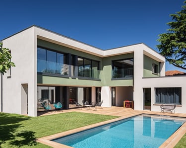 a house with a pool and a large pool