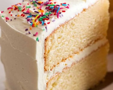 a slice of cake with a slice taken out of it