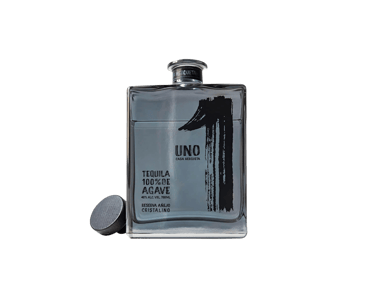 a bottle of uno Tequila Cristalino - premium tequila cristalino