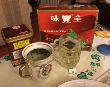 西湖龙井绿茶，和乌龙绿茶的照片。