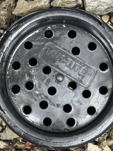 closeup image of a clean drain cover