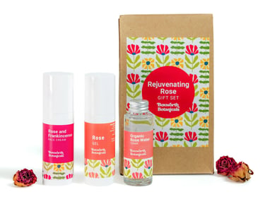 Rejuvenating rose gift set with skincare products, floral packaging and dried roses