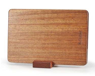 A single-plank solid teak cutting board, plastic-free and glue-free for a non-toxic kitchen.
