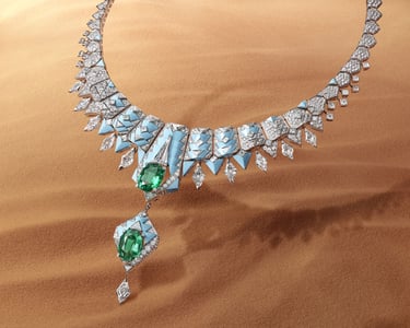 Cartier high jewelry necklace with emerald and diamond accents.