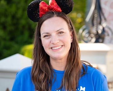 Kate Elliott pictured at Disney's Magic Kingdom® Park.