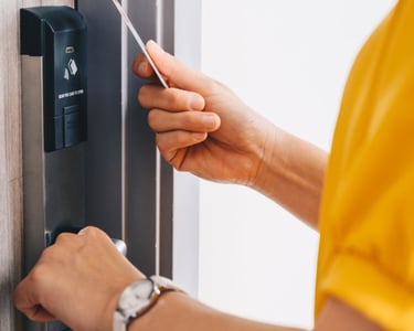 a person fixing their home smart lock