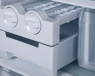 a refrigerator with a refrigerator door open and a drawer with a drawer with a drawer