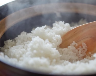 a wooden spoon with a wooden spoon in it