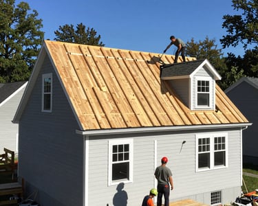 Close-up of hands inspecting roof shingles for wear and damage.