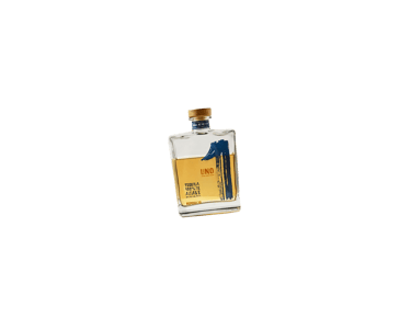 a bottle of tequila - uno tequila reposado