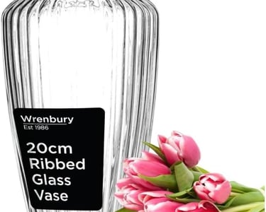 a vase with a vase of flowers and a bottle of wine