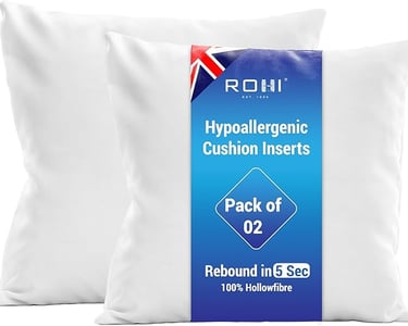 a pair of pillows with a white pillow and a blue and white pillow