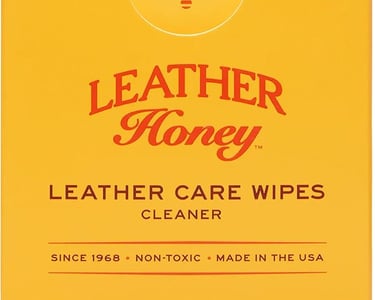 a box of leather care wipes with leatherettery