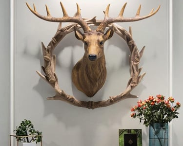 a deer head mounted on a wall in a room