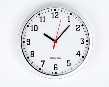a clock with a red and white clock face